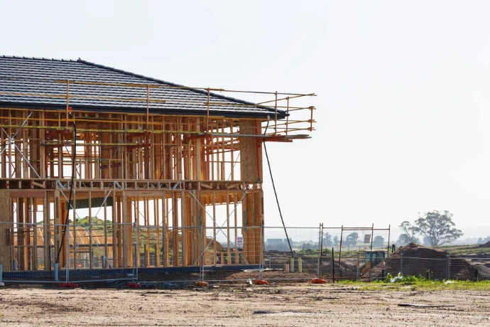 a house under construction with scaffolding around it